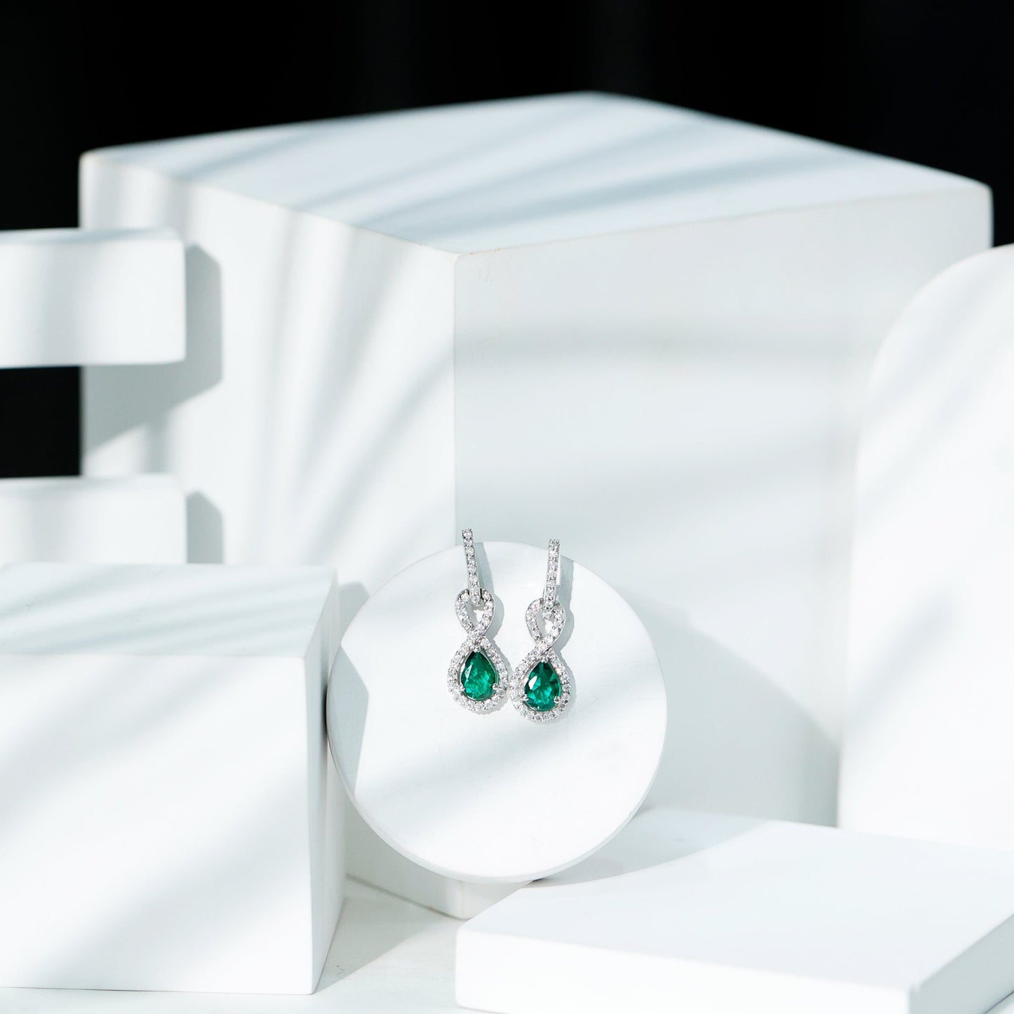 Lab Created Emerald Infinity Drop Earrings with Moissanite