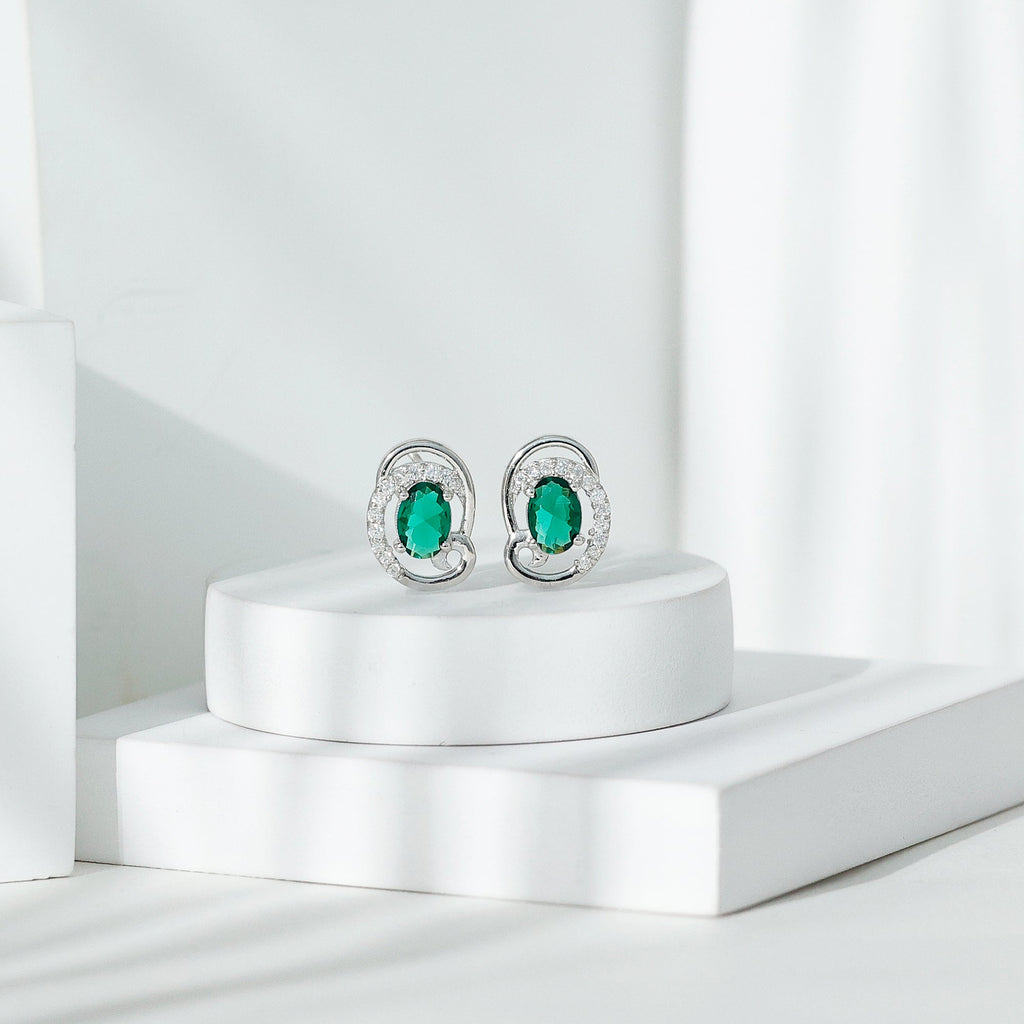 Oval Shaped 5X7 MM Lab Grown Emerald Designer Stud Earrings