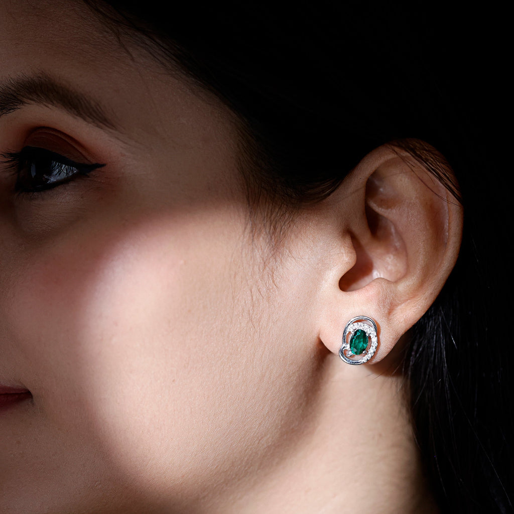 Oval Shaped 5X7 MM Lab Grown Emerald Designer Stud Earrings