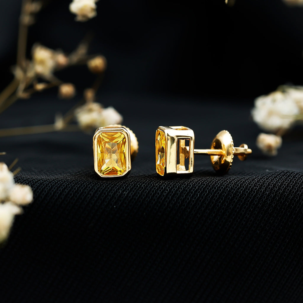 Bezel Set Lab Created Yellow Sapphire Emerald Cut Stud Earrings