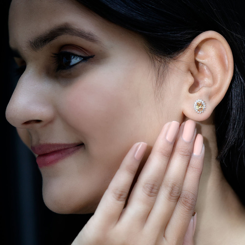 Oval Cut Lab Grown Yellow Sapphire and Moissanite Stud Earrings