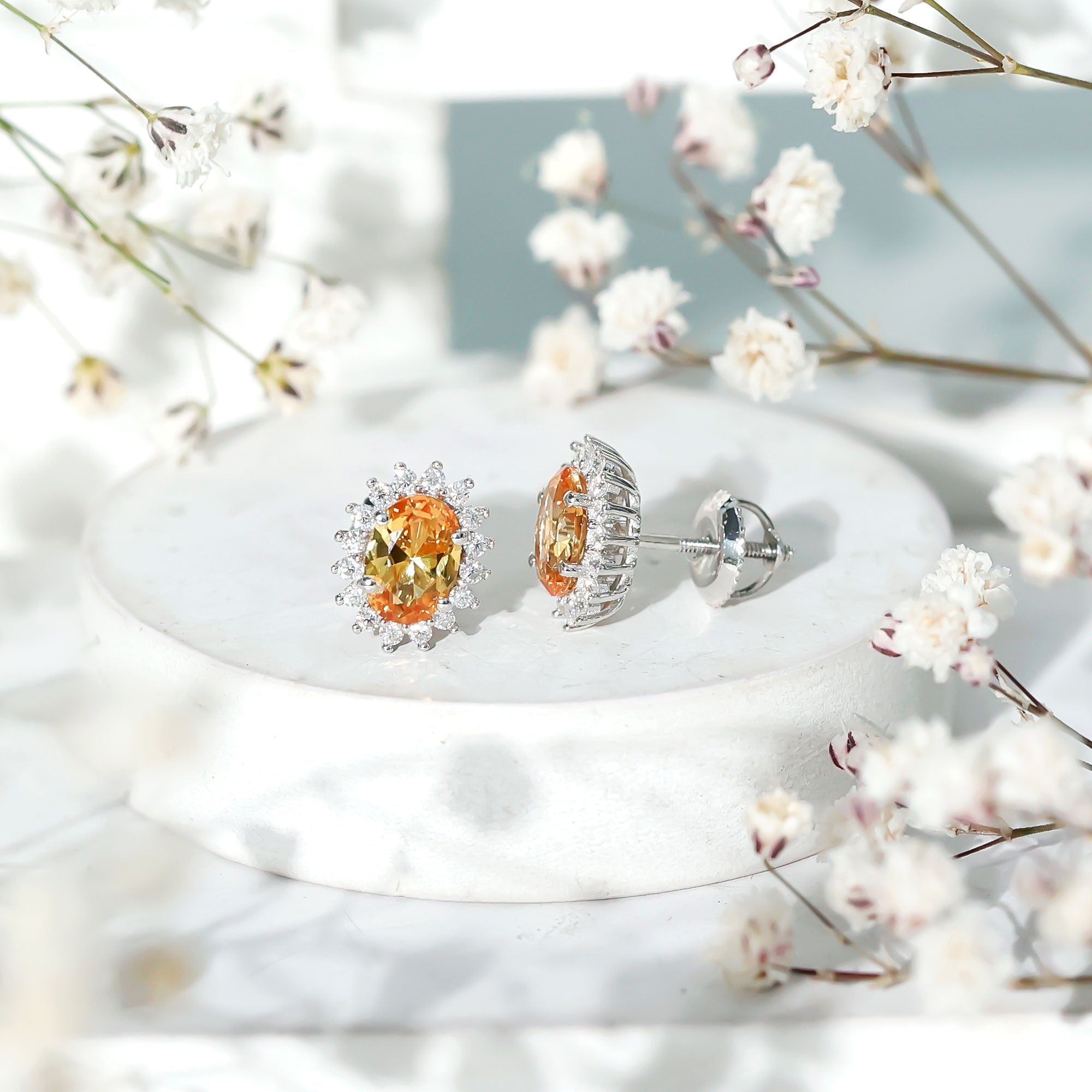 Oval Cut Lab Grown Yellow Sapphire and Moissanite Stud Earrings