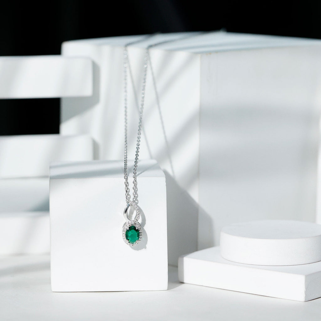 Oval Cut 6X8 MM Lab Created Emerald Infinity Necklace with Moissanite Halo