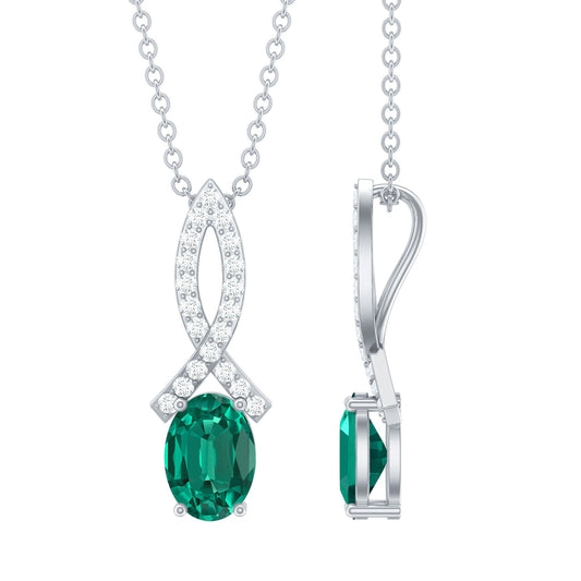 Oval Lab Created Emerald Infinity Pendant with Moissanite in Silver