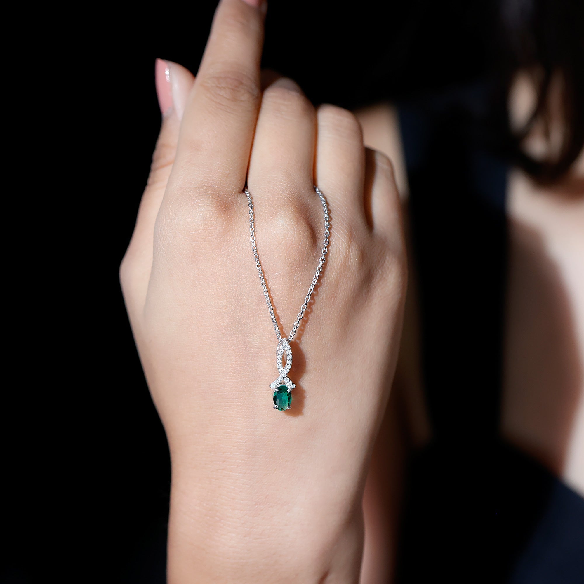 Oval Lab Created Emerald Infinity Pendant with Moissanite in Silver