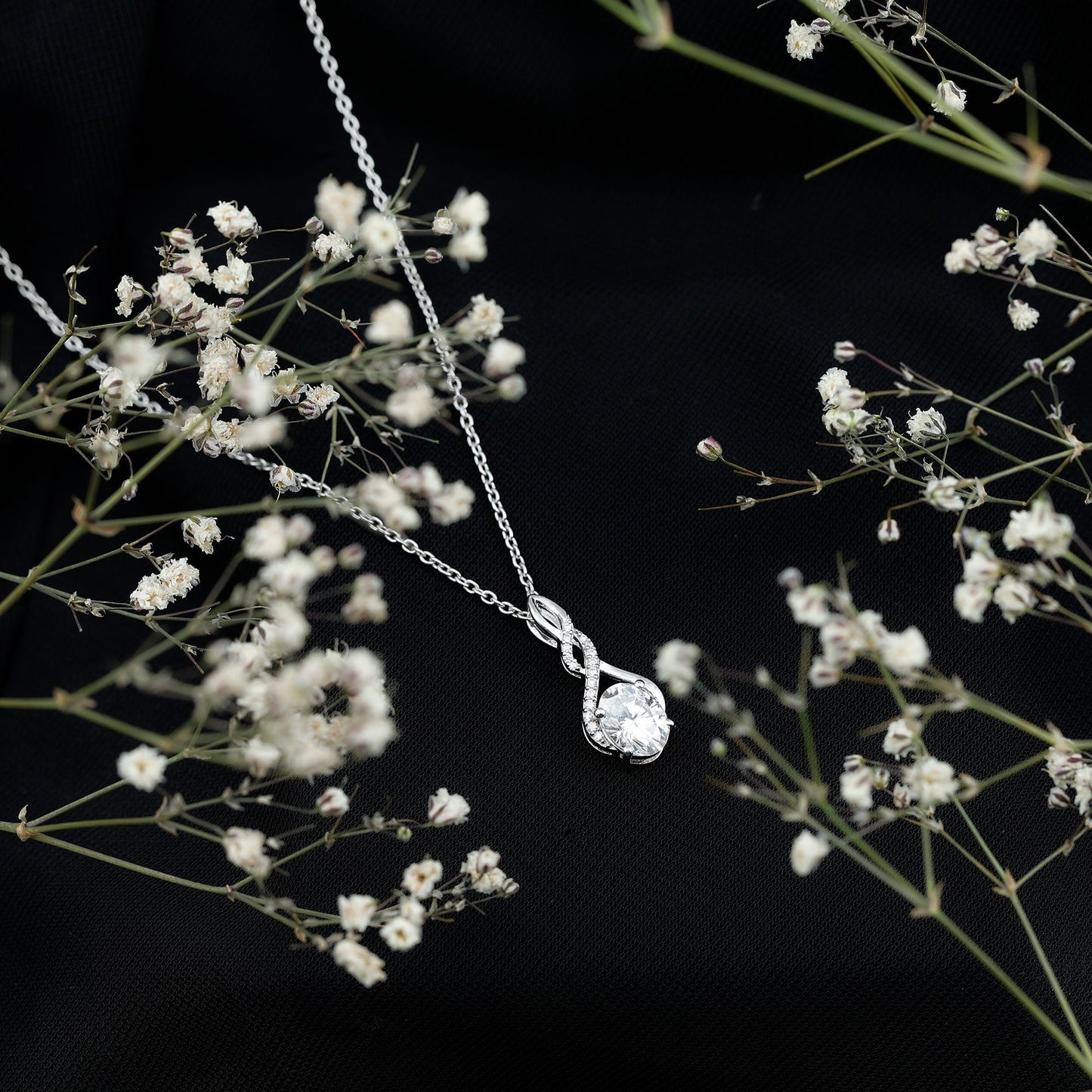 Moissanite Infinity Pendant Necklace in Sterling Silver