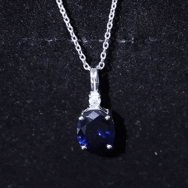 Lab Created Blue Sapphire Oval Cut Solitaire Pendant with Silver Chain