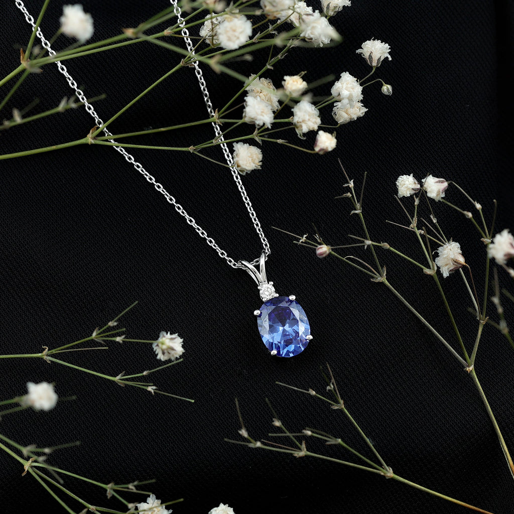 Lab Created Blue Sapphire Oval Cut Solitaire Pendant with Silver Chain