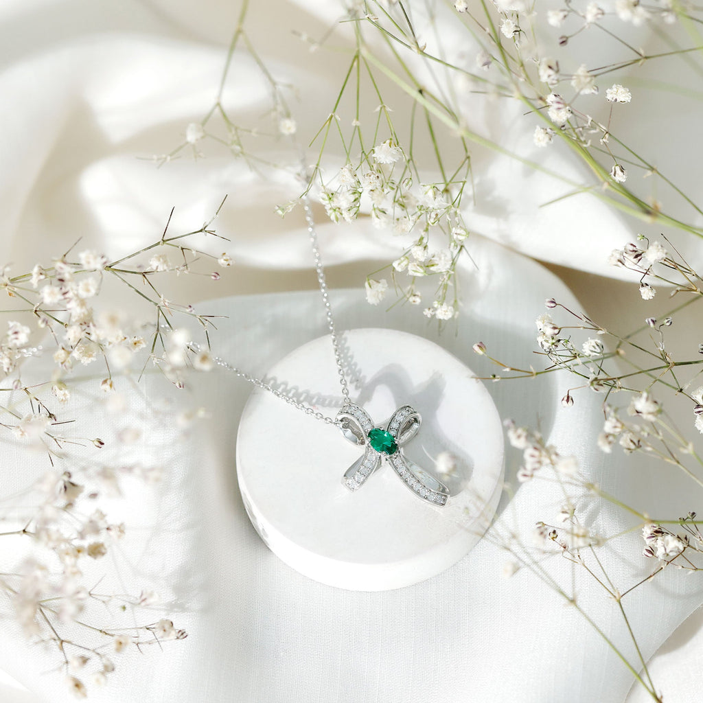 Lab Created Emerald and Moissanite Cross Necklace In Silver