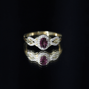 Oval Rhodolite Garnet and Diamond Criss Cross Engagement Ring