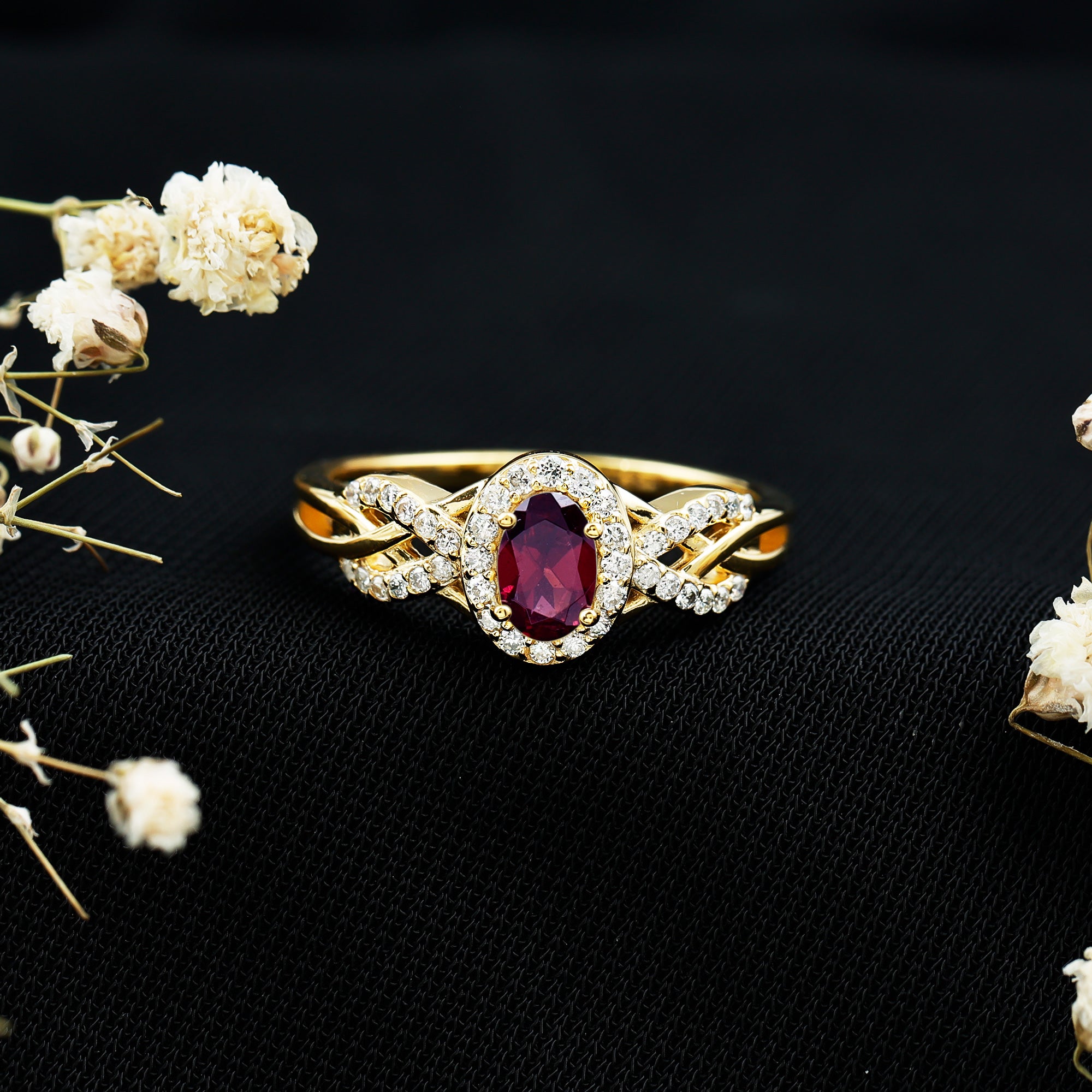 Oval Rhodolite Garnet and Diamond Criss Cross Engagement Ring