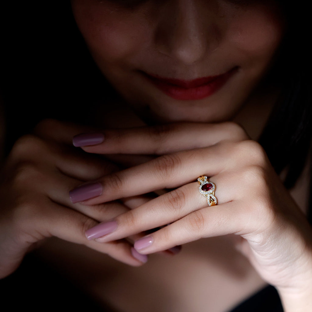 Oval Rhodolite Garnet and Diamond Criss Cross Engagement Ring