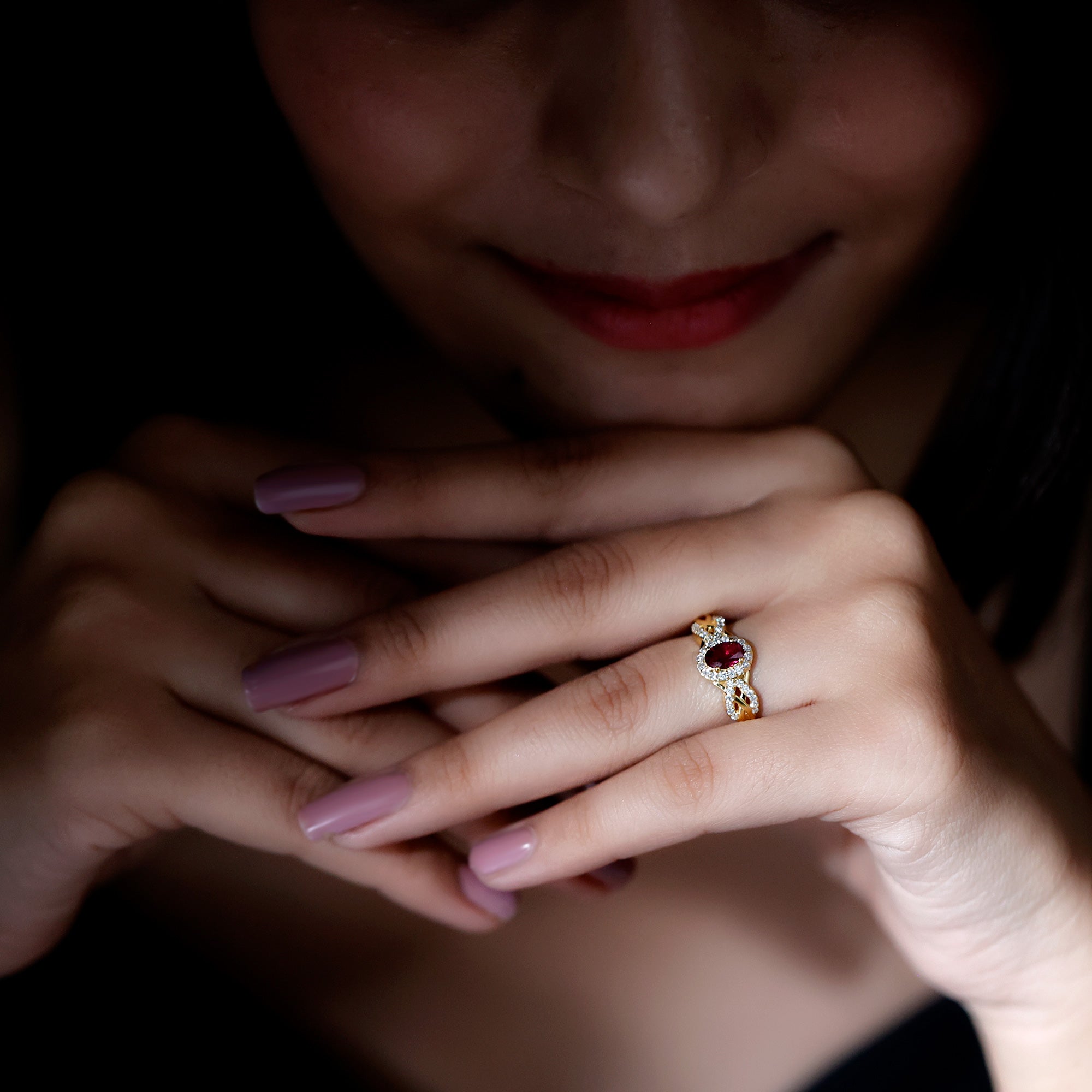 Oval Rhodolite Garnet and Diamond Criss Cross Engagement Ring