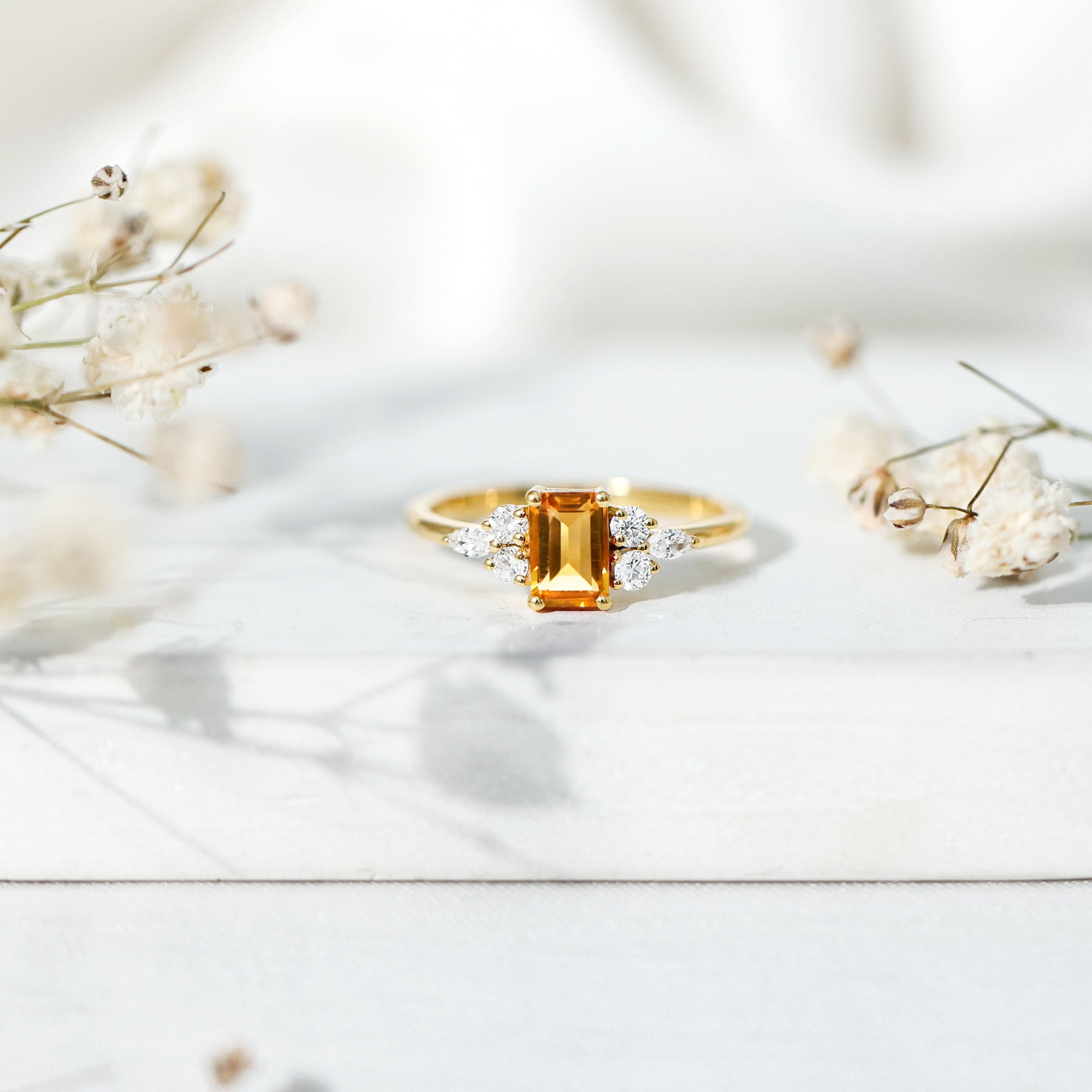 Emerald Cut Citrine Engagement Ring with Diamond Trio in Silver