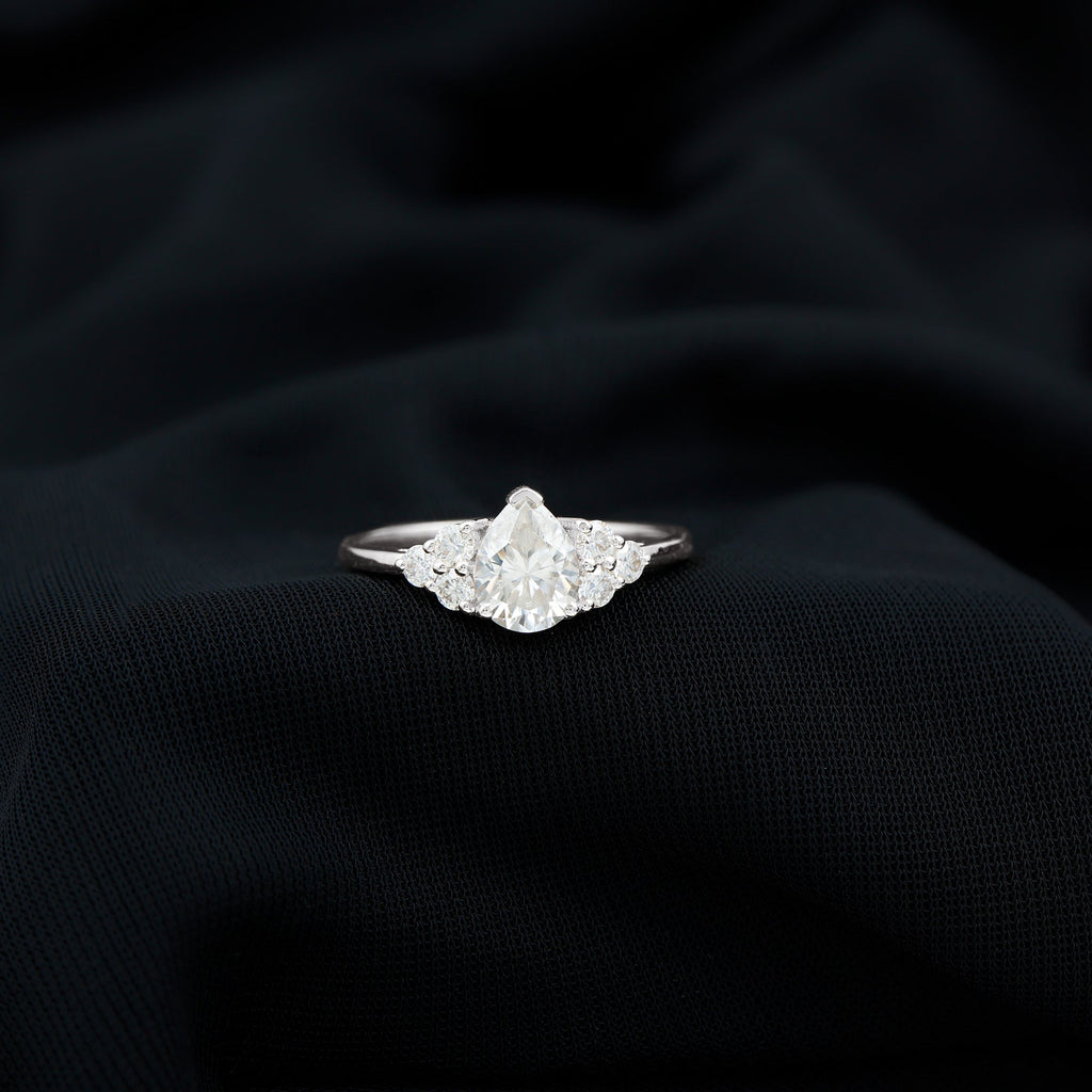 Lab Grown Diamond Teardrop Engagement Ring With Round Shape Trio