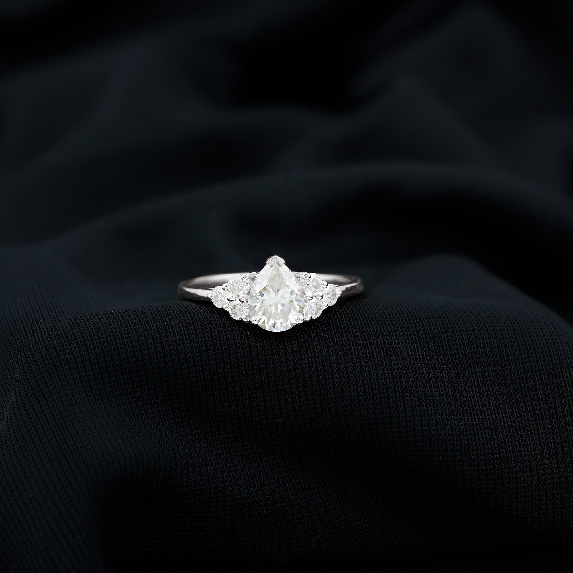 Lab Grown Diamond Teardrop Engagement Ring With Round Shape Trio