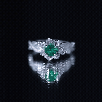 Lab Created Emerald and Diamond Flower Engagement Ring in Silver