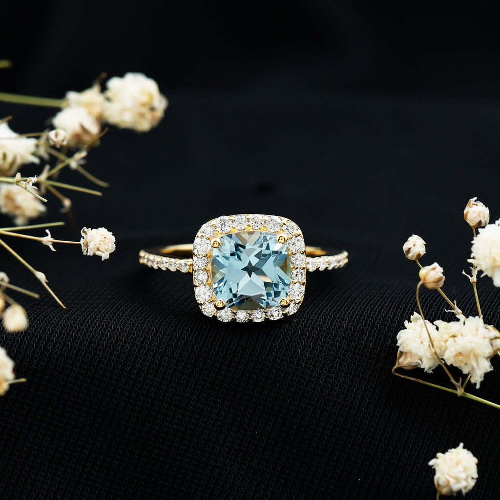 Cushion Cut Sky Blue Topaz and Diamond Halo Engagement Ring