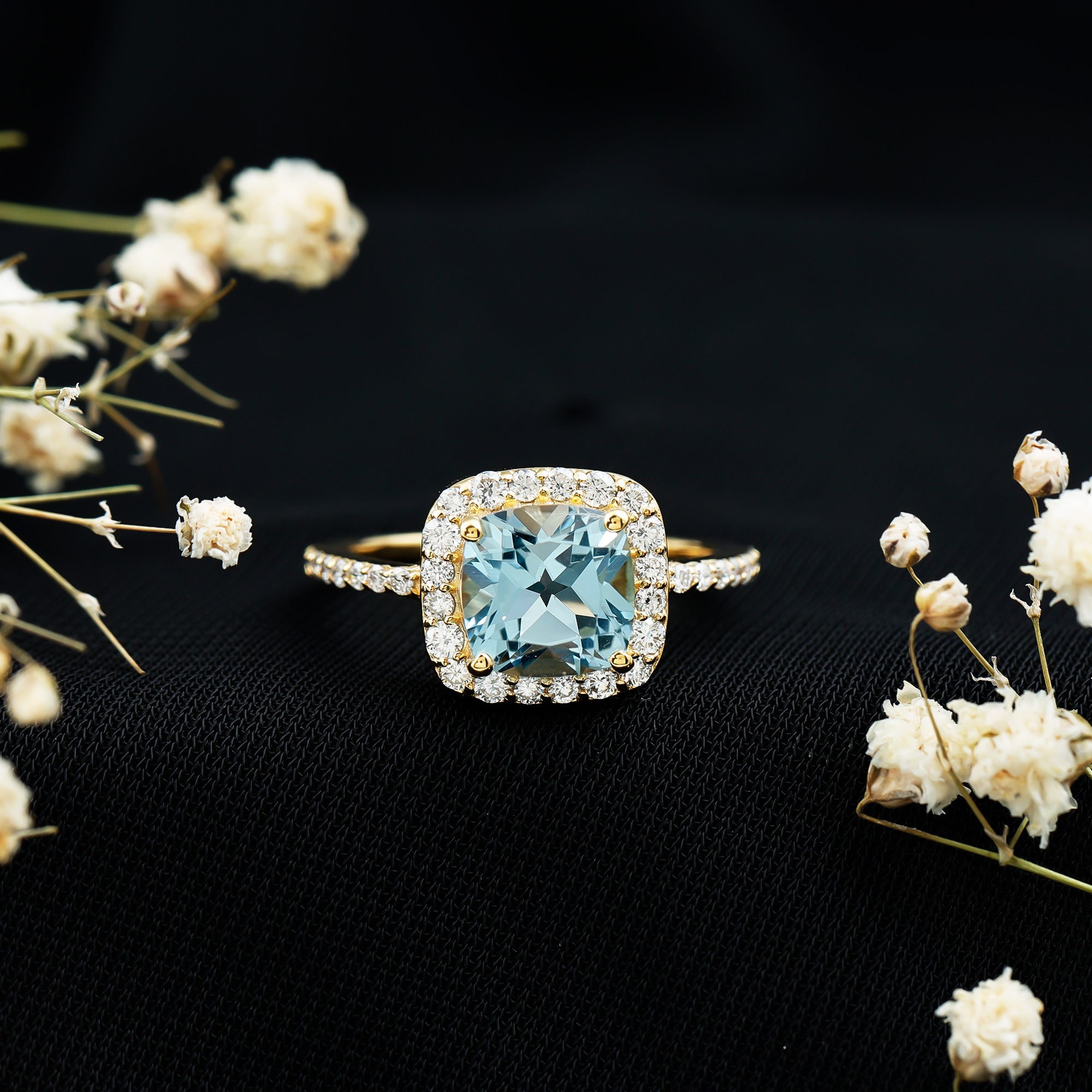 Cushion Cut Sky Blue Topaz and Diamond Halo Engagement Ring